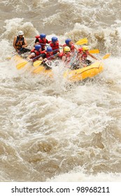 rafting white water extreme sports rowing rapids river whitewater boat group of mixed pioneer male and femininity with guided by specialist pilot on whitewater river rafting in ecuador rafting white w