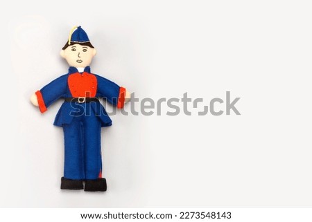 Rag doll, Mexican child heroes, cadet or soldier, on white background, space for text