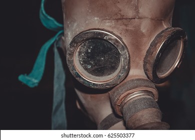 Ragged gas mask on the table