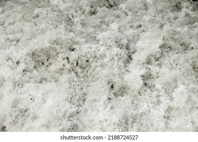 Raging Muddy Water Of A Mountain River