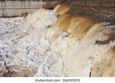 Raging Muddy Water In The River