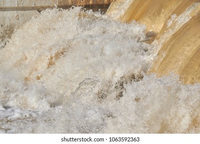 Raging Muddy Water In The River