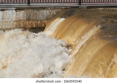 Raging Muddy Water In The River