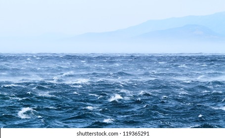 Raging sea with furious waves and fierce wind