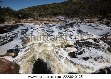 The raging waters of Bell's Rapids at the confluence of the Avon and Swan Rivers near Baskerville, Western Australia.