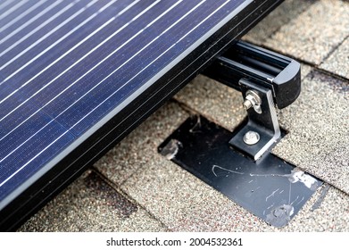 Rail, Bracket, And Anchor To A Solar Panel Installed On A Asphalt Shingle Roof