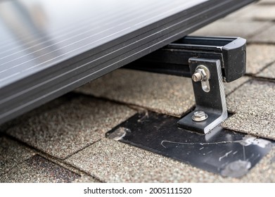 Rail, Bracket, And Anchor To A Solar Panel Installed On A Asphalt Shingle Roof