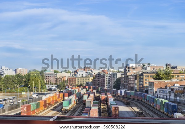 Rail cars loaded with\
containers wait at the waterfront rail yard in Vancouver British\
Columbia Canada.