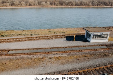 Rail Scales For Static And Coupled In Motion Weighing With Station House Next To River