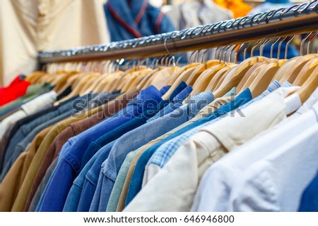 Rail of second-hand clothes on display at Old Spitalfields Market in London Stock photo © 