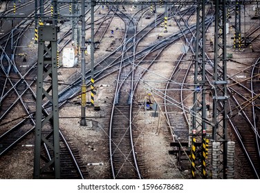 Rail tracks and intersections at main train station in Prague, Czech Republic. Abstract for destination and arrival.