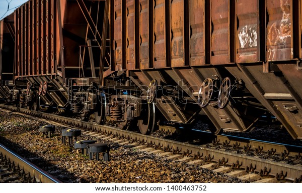 Rail\
transportation. Old freight car and railway\
track