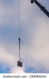 The railing at the hook of the crane