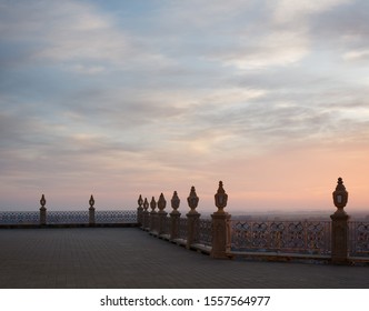 railing with lanterns on the background of the evening sky. Holy Assumption Pochaev Lavra.