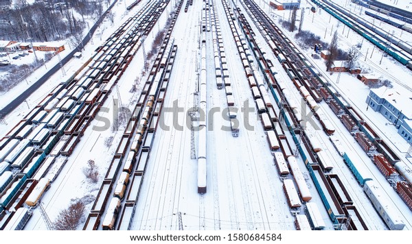 Railroad cars at the station, aerial view,\
industrial background