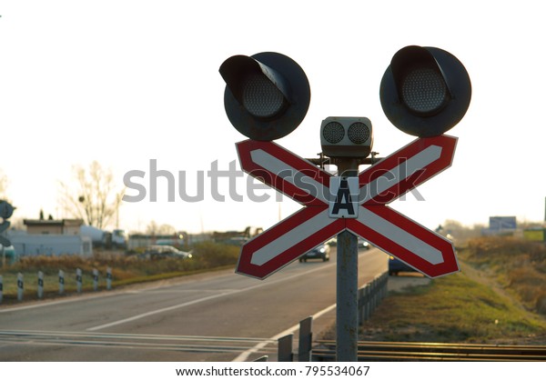 railroad crossing and traffic light,
traffic lights at a railway crossing, railway
semaphore