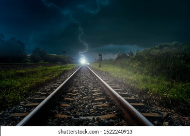 Railroad and lightning on a beautiful stormy day. - Powered by Shutterstock