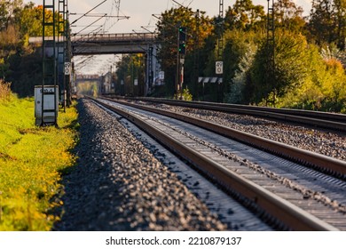 Railroad Rails On A Track In The Ballast Bed Pass Under A Bridge