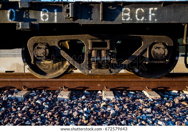 Railroad side view., Closeup view of the wheels of\
a train.