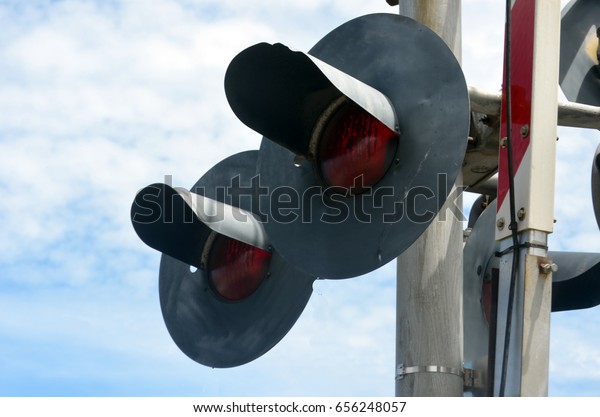 Railroad signal lights at\
train station 