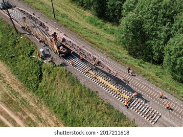 Railroad Track Construction. Train Track Repair And Maintenance. Out Of Focus, Possible Granularity, Motion Blur. Sharpening Noise