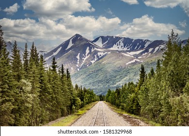 Railroad track in the wilderness of Alaska - Powered by Shutterstock