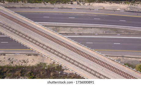 Railroad Tracks Above Highway Road.