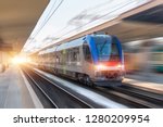 Railroad travel passenger train with motion blur effect, industrial concept, tourism