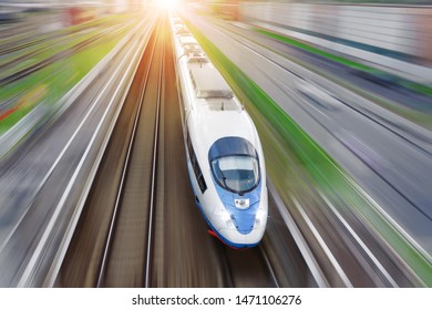 Railroad Travel Passenger Train With Motion Blur Effect, Industrial A District Of The City, Top Aerial View From Above