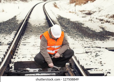 Railroad Worker With Adjustable Wrench In The Hand