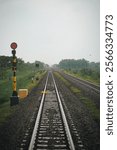 Railtracks in Indonesia, photographed from behind a carriage