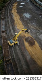 A Railway Aggregate Excavator Moving Stone