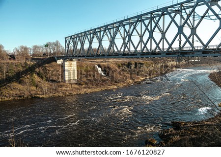Railway bridge over the river.
Sunny spring day.
The border of Ivangorod Narva. Russia Estonia