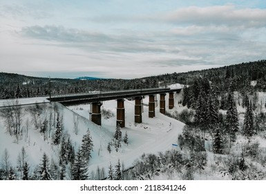 Railway Bridge In The Winter Taiga