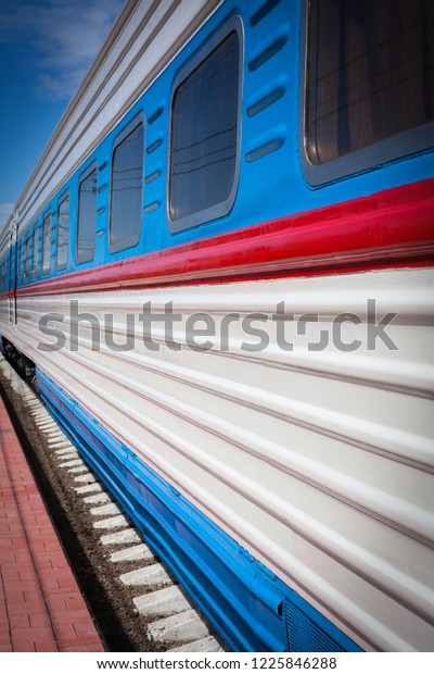 Railway car with Windows on the platform. Train\
the colors of the Russian flag stands on the platform. The train in\
the future on the station\
platform.