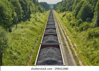 Railway cargo cars carrying coal