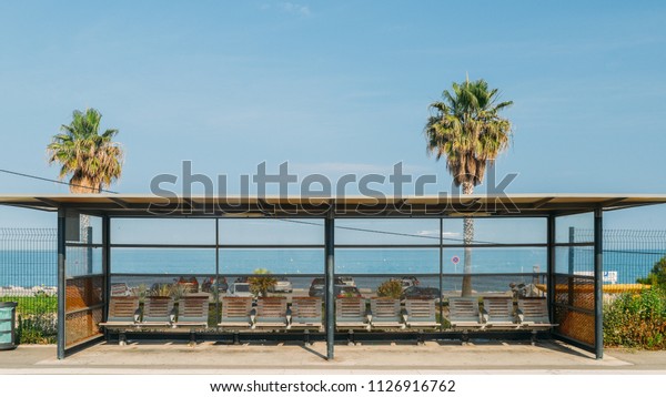 Railway covered stop in\
Villeneuve Loubet, Cote d\'Azur, France overlooking the\
Mediterranean Sea,\
France