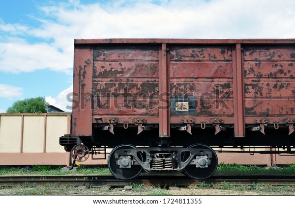 railway freight car on rails for the transport\
of industrial goods.\
Transport