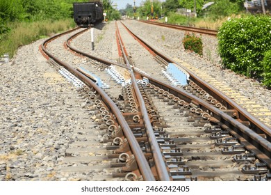 Railway line intersections at train stations in Indonesia