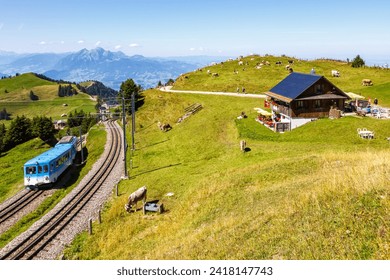 Arth–Rigi railway line rack railway train on Rigi mountain in Swiss Alps in Switzerland