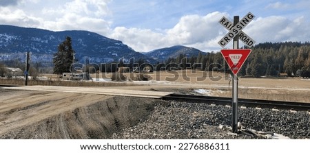 The railway line and yield sign in the Northwestern United States