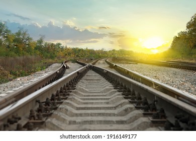 Railway Lines With Track Ballast In Countryside. Train Journey