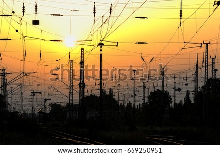 Railway posts with sunset
