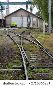 A railway shed is a building for storing, basic maintenance, and protection of locomotives and cars, with tracks, covered stalls, workshops, and material storage, often part of a depot.