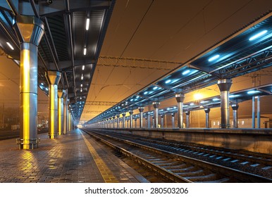 Railway station at night. Train platform in fog. Railroad in Donetsk. - Powered by Shutterstock