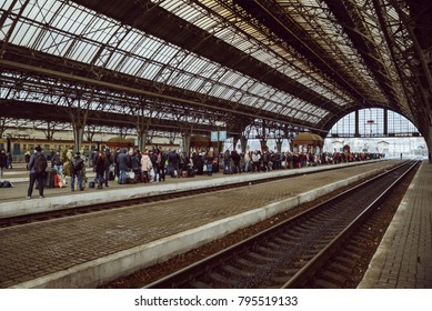 railway station with roof people waiting for train - Shutterstock ID 795519133
