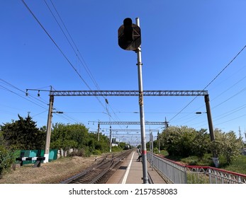 A Railway Station. A Traffic Light, Wires And A Railroad On The Platform. A Transit Hub