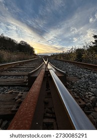 Railway Switch Tracks at Sunset With Dramatic Sky