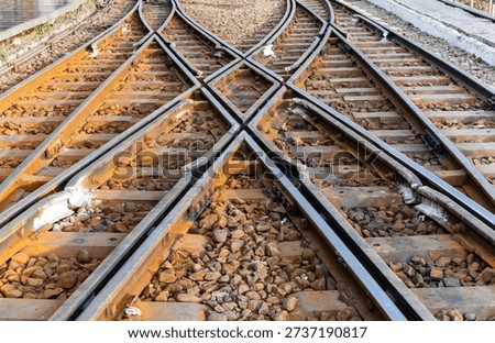 railway track junction with multiple rail lines intersecting