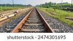 A railway track or railroad track, is the structure on a railway or railroad consisting of the rails. It enables trains to move by providing a dependable surface for their wheels to roll upon.